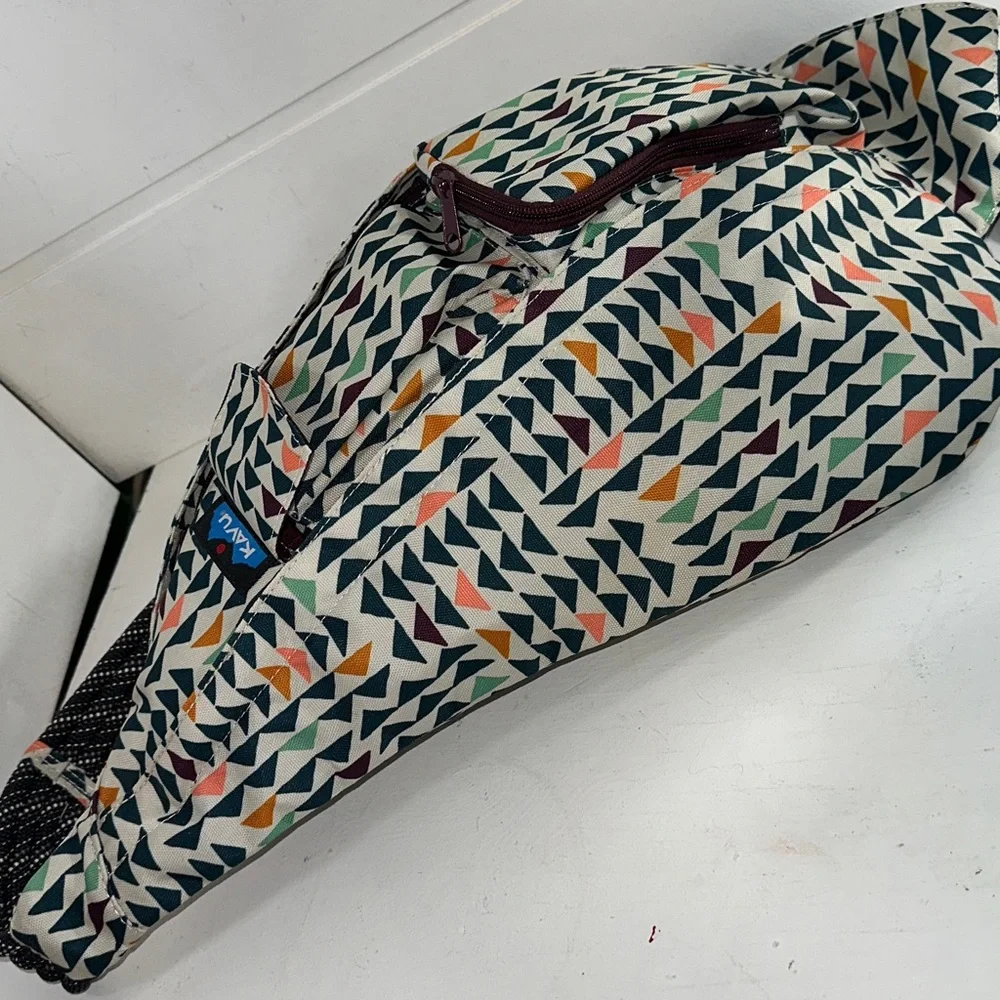 Kavu Geometric Triangle Sling Backpack in Cream, Black, Orange, Green, Navy